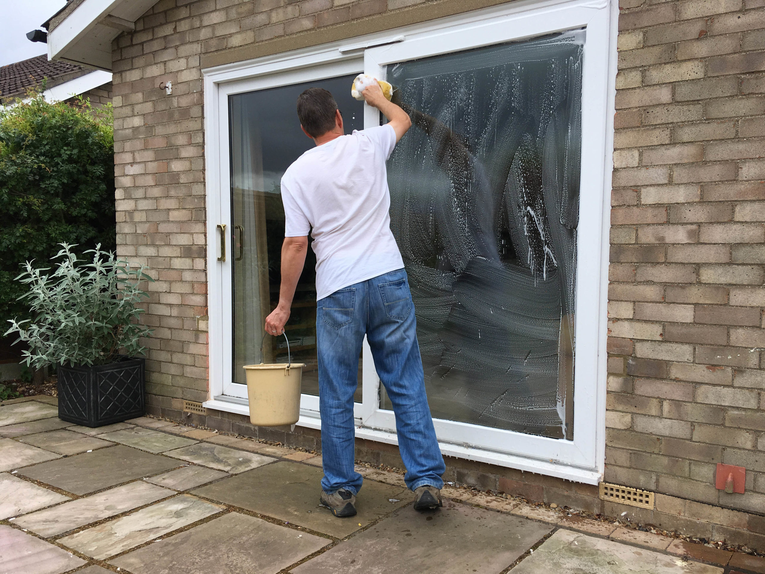 summer cleaning tips - image 2 - cleaning sliding patio doors